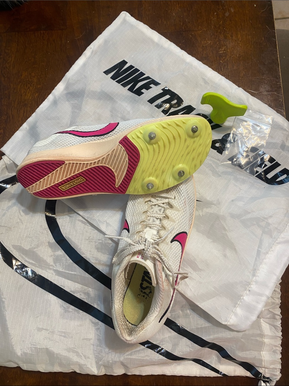 Nike White Racing Spikes with Pink Swoosh